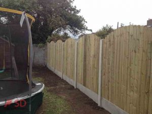 Curved Fencing Panels With Concrete Posts and Boards